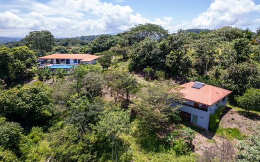 In gated community close to town with large pool and land – 40005152789